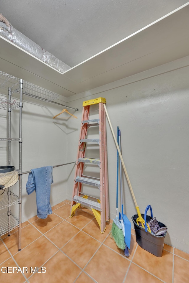 interior space featuring tile patterned flooring