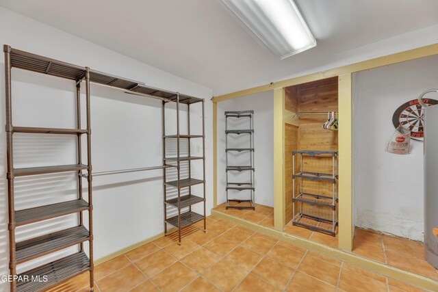 basement with tile patterned floors