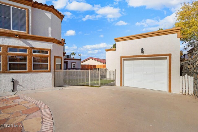 exterior space with a garage