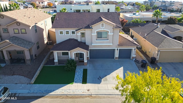 12298 Stansbury Dr, El Paso, TX 79928 - view of front facade featuring a garage