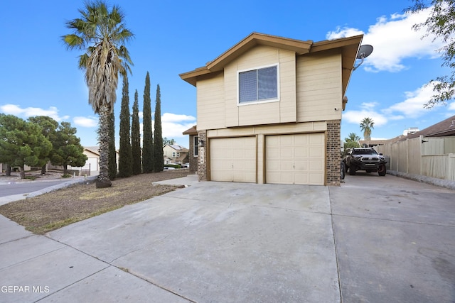 view of property exterior with a garage