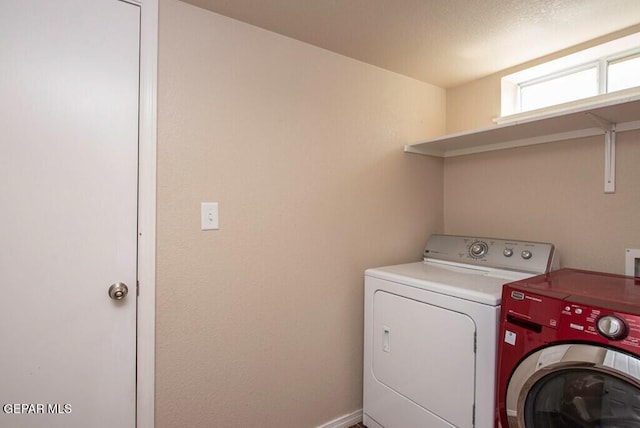 laundry room featuring independent washer and dryer