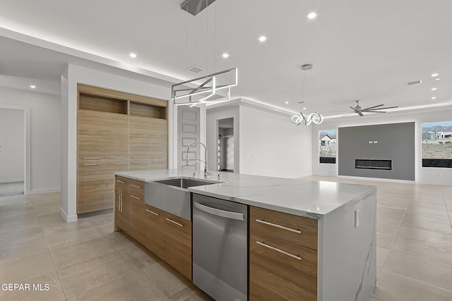 kitchen with ceiling fan, dishwasher, a spacious island, and decorative light fixtures