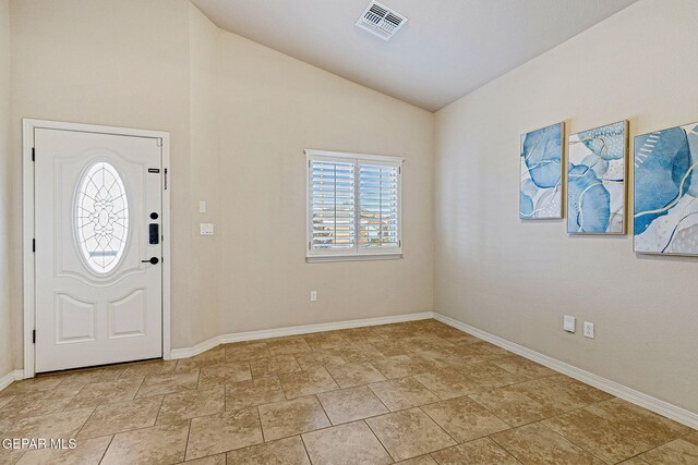 foyer with lofted ceiling