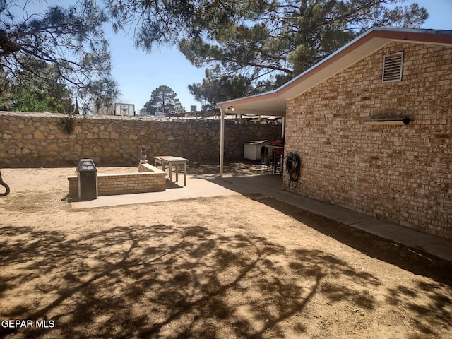 view of yard with a patio area