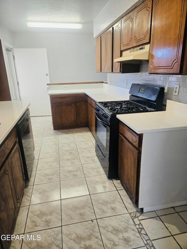 kitchen with tasteful backsplash and black appliances