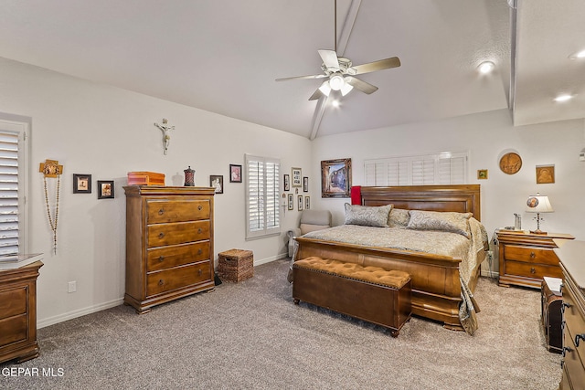 bedroom with carpet, ceiling fan, and lofted ceiling