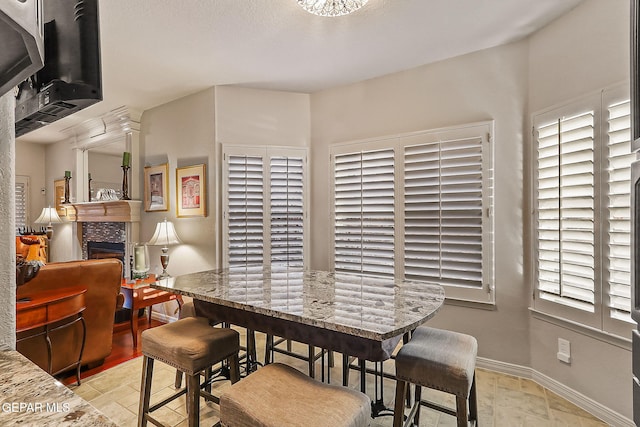 dining room with a fireplace