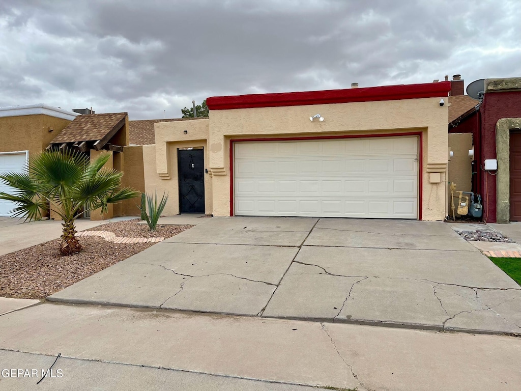 adobe home with a garage