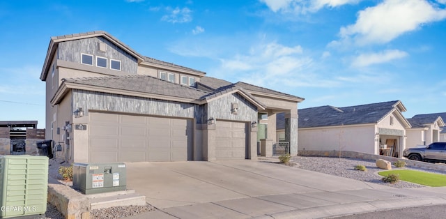 view of front of property with a garage