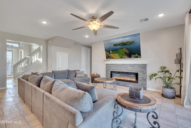 912 Crystal Deer Dr, El Paso, TX 79928 - living room with a tiled fireplace and ceiling fan