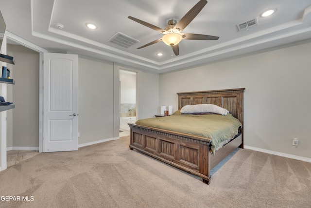 912 Crystal Deer Dr, El Paso, TX 79928 - carpeted bedroom featuring ceiling fan, a raised ceiling, and ensuite bathroom