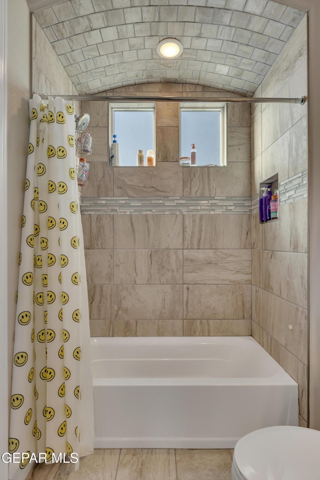 912 Crystal Deer Dr, El Paso, TX 79928 - bathroom featuring toilet and shower / tub combo with curtain