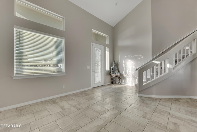 912 Crystal Deer Dr, El Paso, TX 79928 - foyer featuring stairs, marble finish floors, and high vaulted ceiling