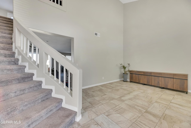 912 Crystal Deer Dr, El Paso, TX 79928 - staircase featuring a towering ceiling