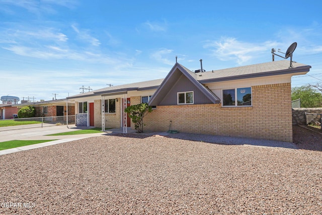 single story home featuring a patio area