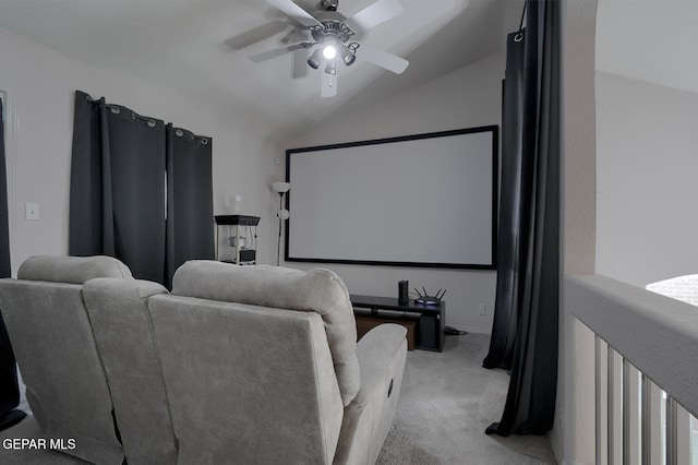 carpeted home theater featuring vaulted ceiling and ceiling fan