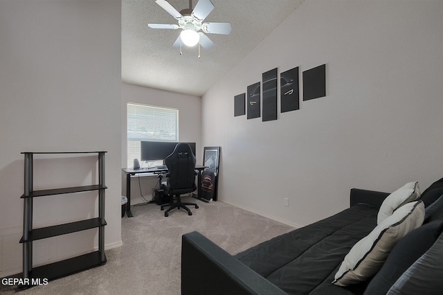 carpeted bedroom featuring lofted ceiling, a textured ceiling, and ceiling fan