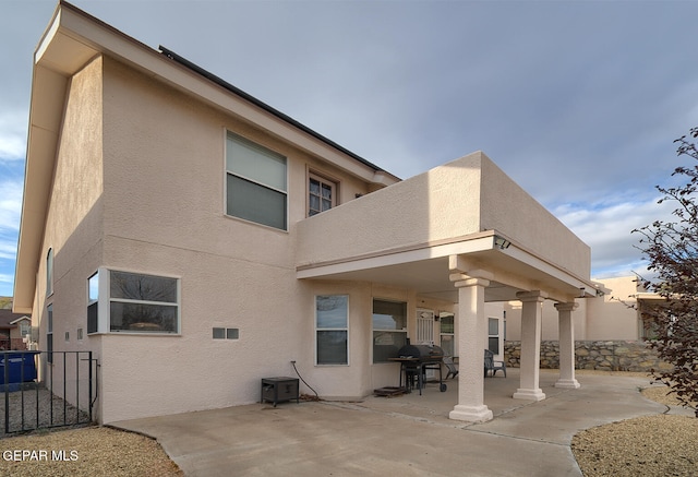 rear view of property with a patio