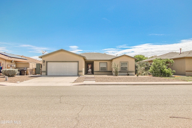 ranch-style home with a garage