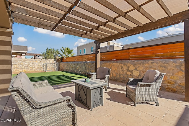 view of patio with a pergola and an outdoor living space with a fire pit