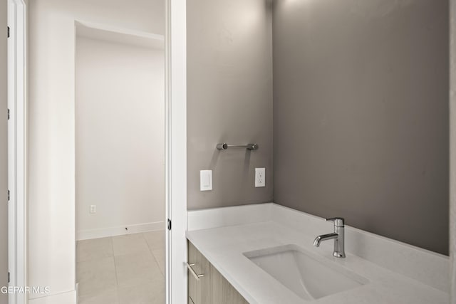 bathroom with tile patterned floors and vanity