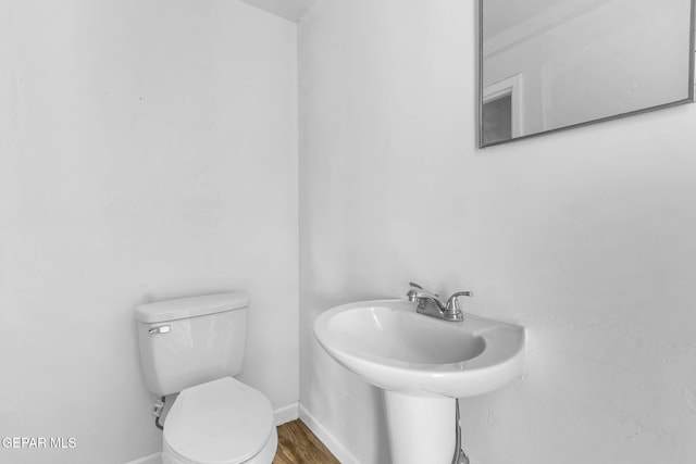 bathroom featuring toilet