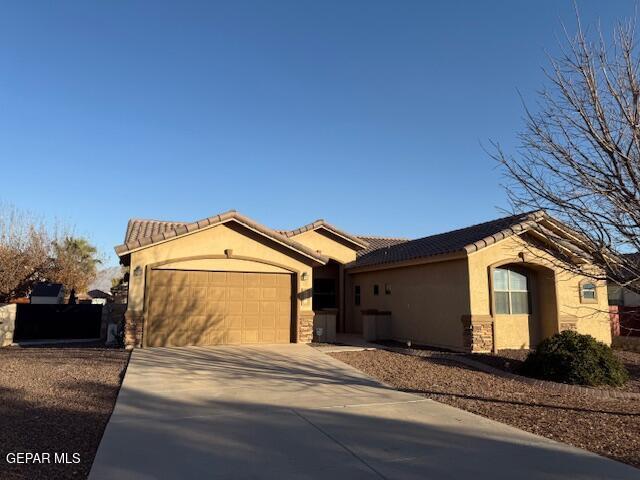 view of front of property with a garage