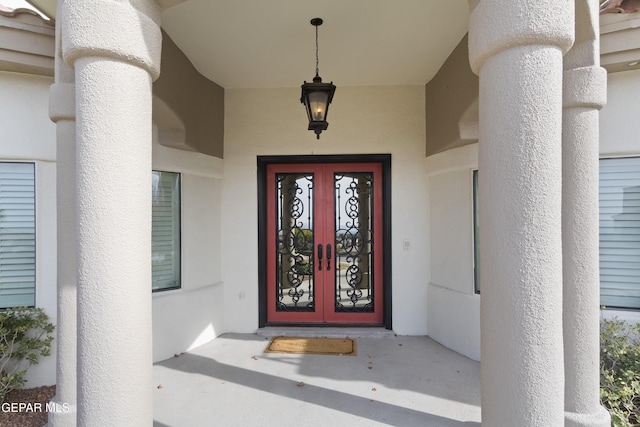 entrance to property featuring french doors