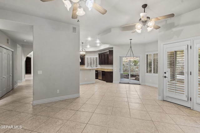 interior space featuring ceiling fan and light tile patterned flooring