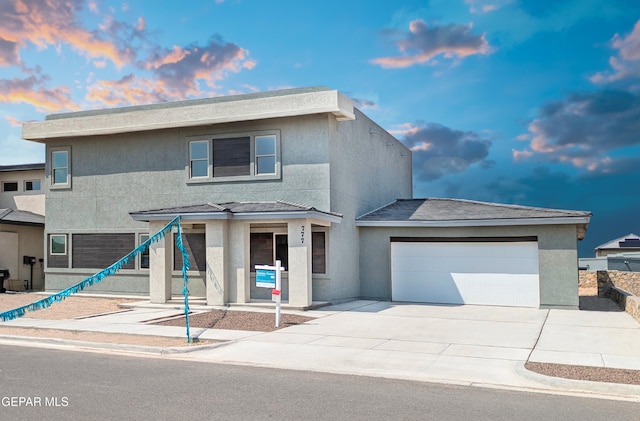 view of front of home with a garage