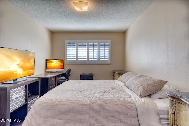 bedroom with a textured ceiling