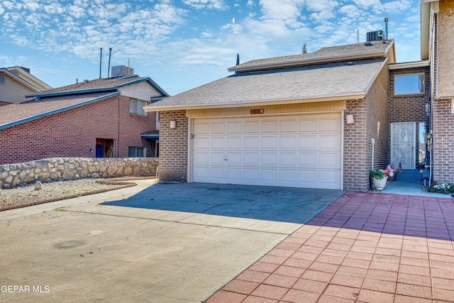 exterior space with a garage