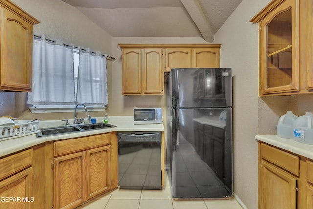 kitchen with a textured ceiling, sink, black appliances, light tile patterned floors, and vaulted ceiling with beams