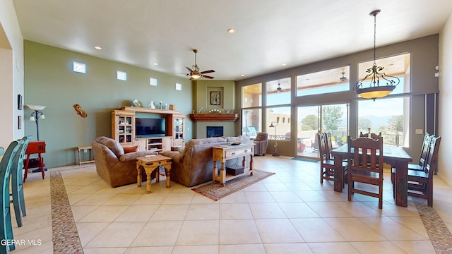 tiled living room featuring ceiling fan