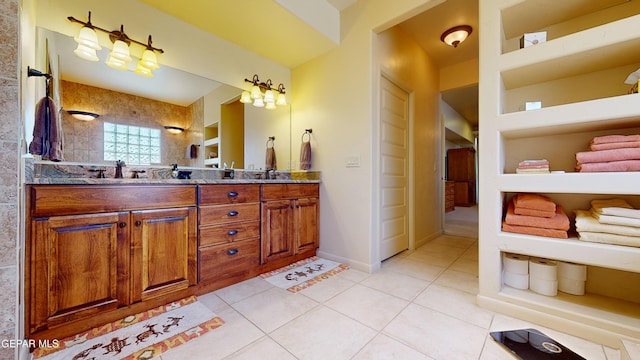 bathroom featuring tile patterned flooring and vanity