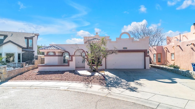 view of front of property with a garage