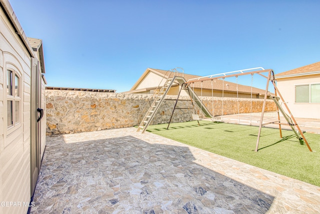 view of patio / terrace featuring a playground