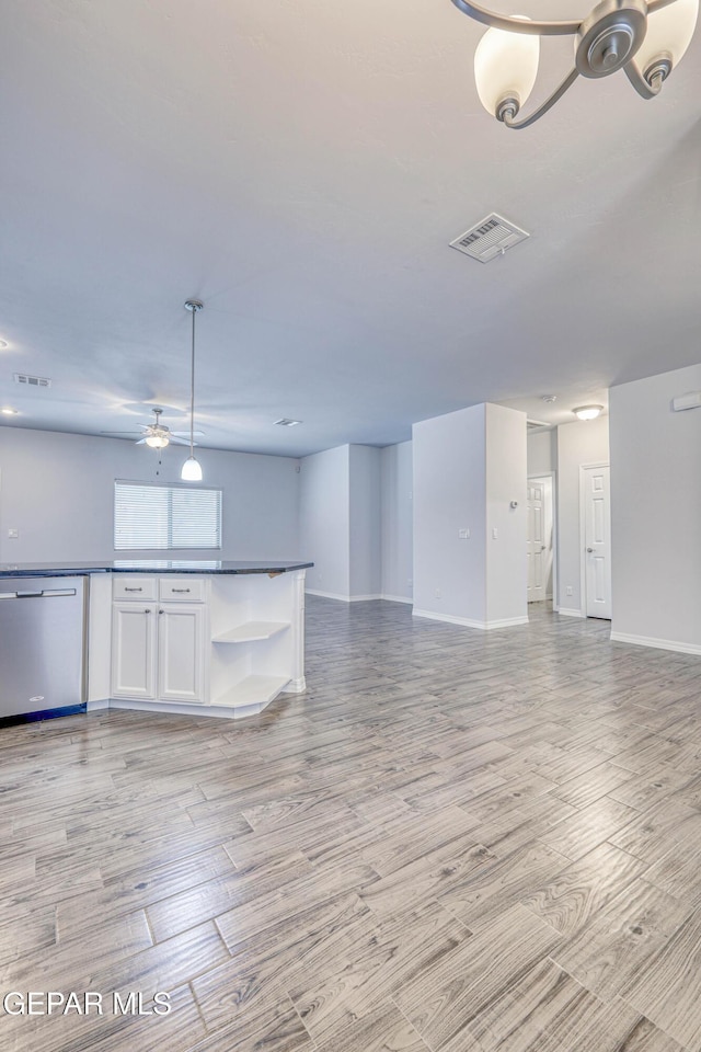 interior space featuring ceiling fan and light hardwood / wood-style floors