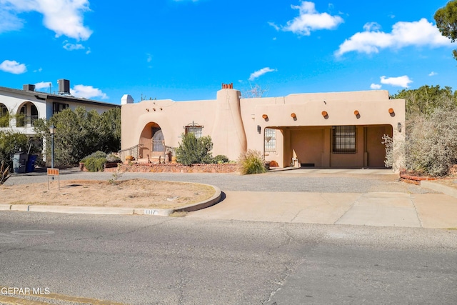 view of adobe home