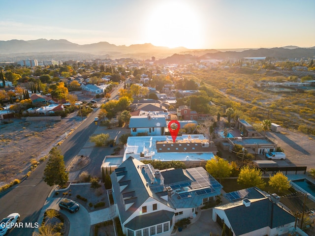 aerial view at dusk with a mountain view