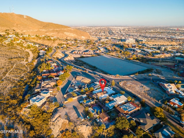 bird's eye view with a mountain view