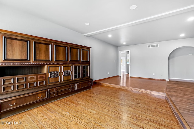 unfurnished living room with light hardwood / wood-style flooring