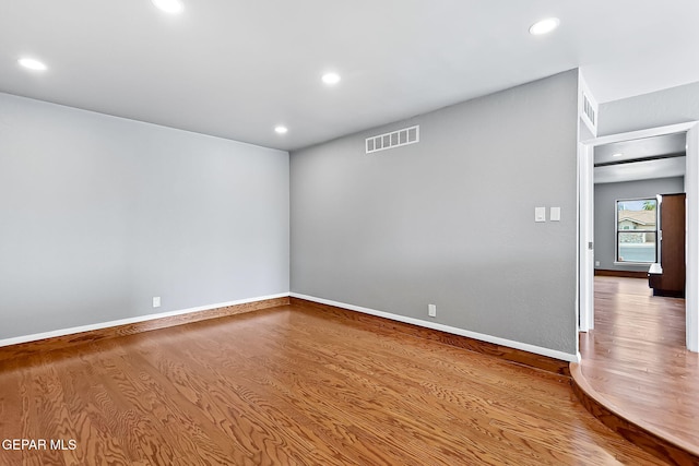 17001 Darrington Rd, Horizon City, TX 79928 - unfurnished room with wood finished floors and recessed lighting