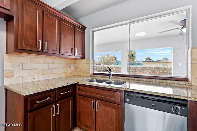 17001 Darrington Rd, Horizon City, TX 79928 - kitchen with stainless steel dishwasher, healthy amount of natural light, ceiling fan, and light stone countertops