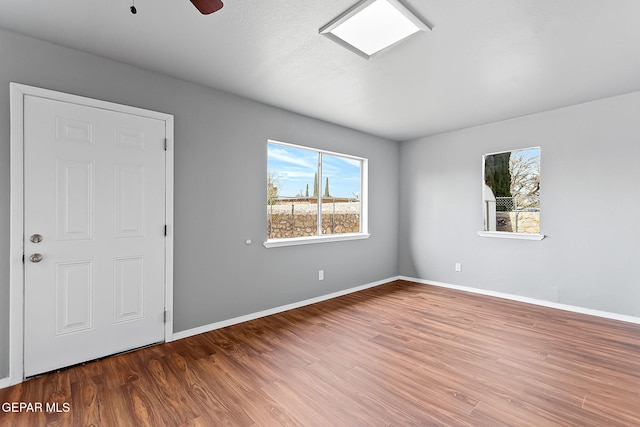 17001 Darrington Rd, Horizon City, TX 79928 - unfurnished room with wood finished floors and baseboards