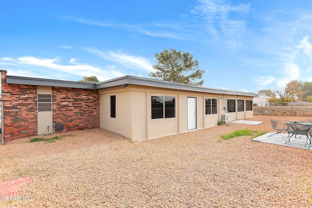 rear view of house with a patio area