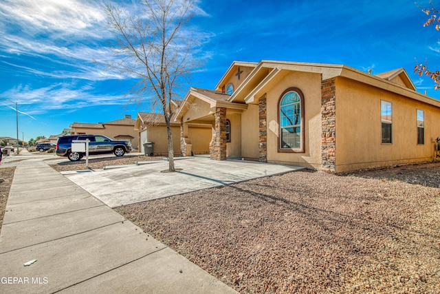 view of front of property featuring a garage