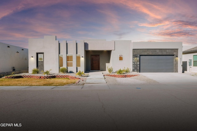 view of front of home featuring a garage