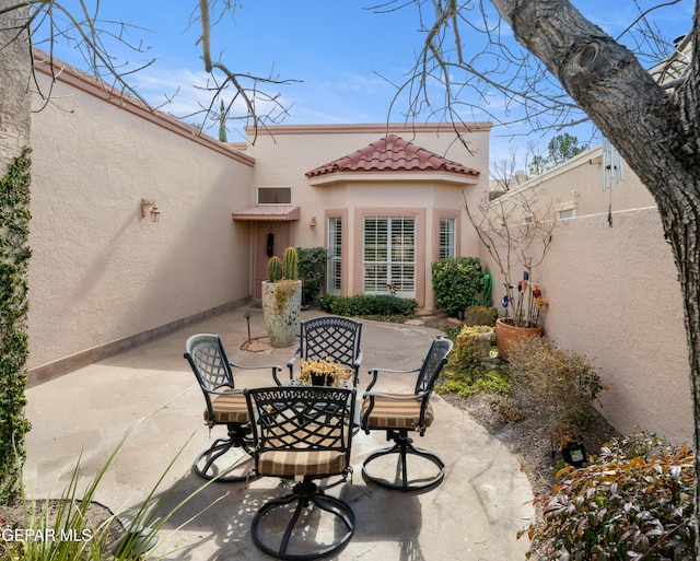 view of patio featuring outdoor dining space